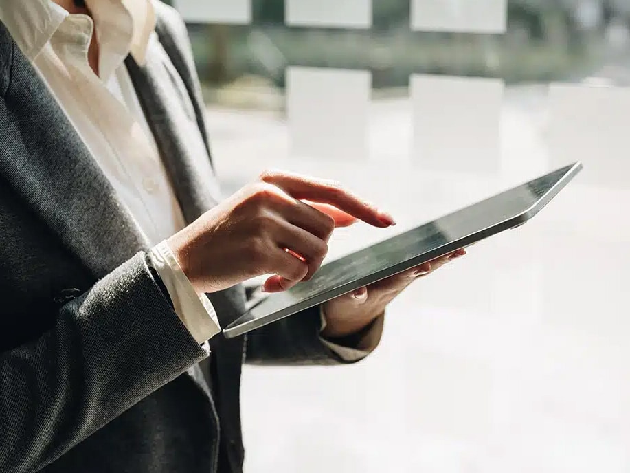 Close up of a professional using a tablet, e logbooks